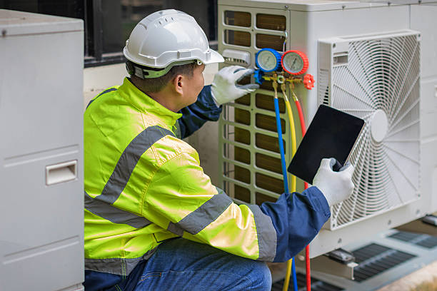 Professional Hvac technician working in Hampton, NY